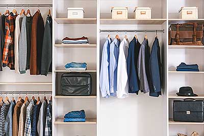 clothes neatly organized in a closet